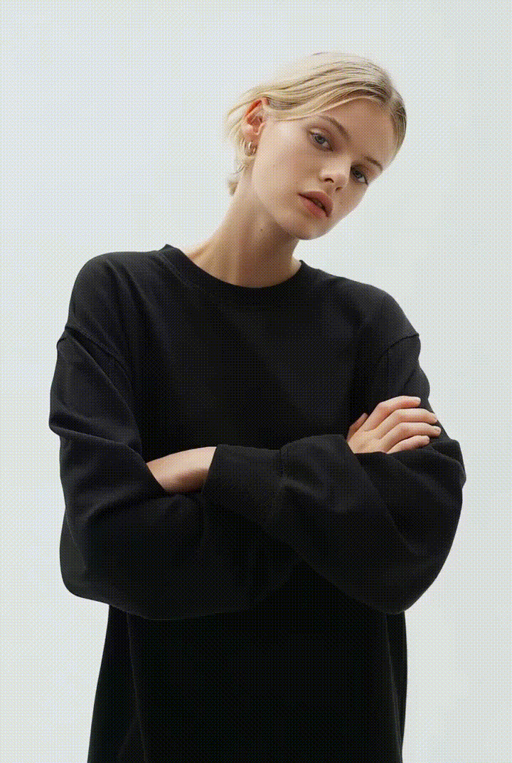 Model posing for the camera gif